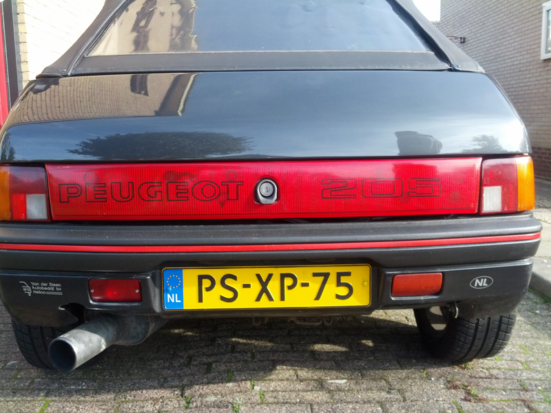Illustration for article titled Test drove the '87 Peugeot 205 CTI (convertible GTI)